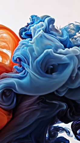 the smoke is blue and orange. it looks like a wave. the colors are bright and vibrant