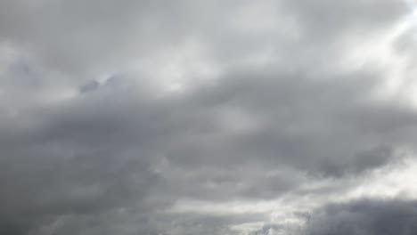 mid afternoon thunderstorm rain clouds forming and blending across the african horizon time lapse, noise free 4k footage