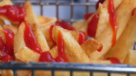 close-up view of french fries with ketchup