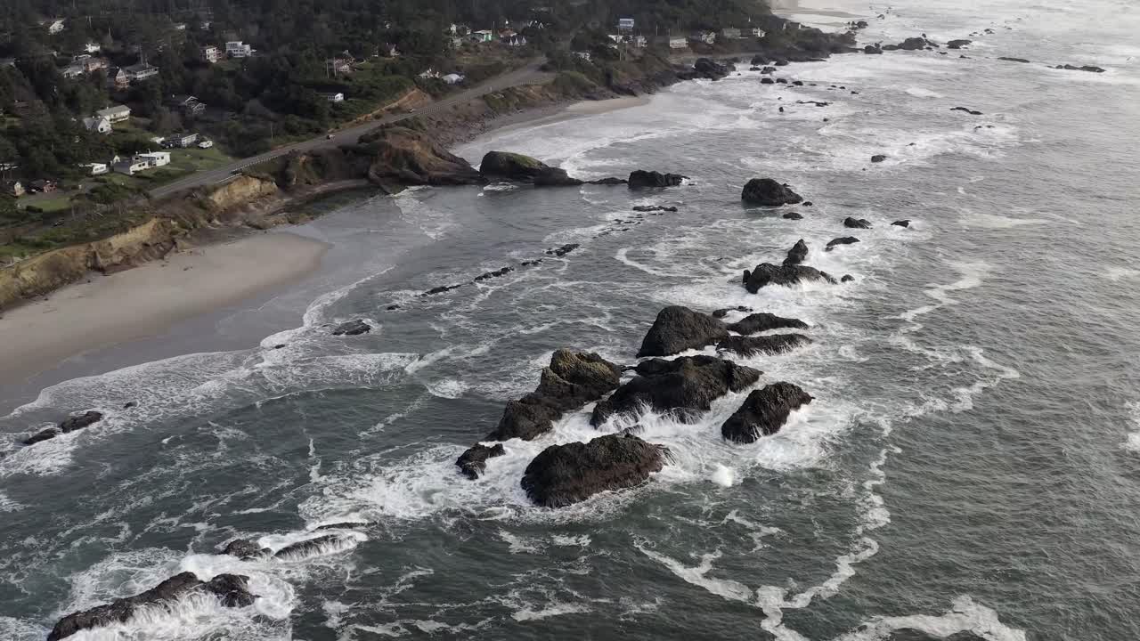 Rising cinematic aerial, Seal Rock in North Pacific Ocean