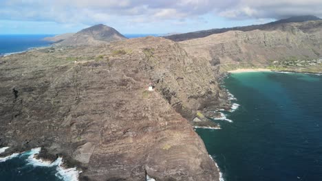 aerial panning right view of the makapuu lighthouse and trail in waimanalo hawaii