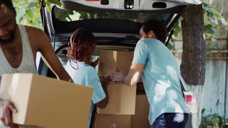 Volunteers At Food Drive Give Donations