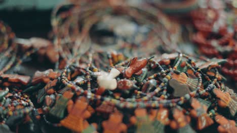 Guatemalan-necklaces-and-bracelets.-Handheld-shot