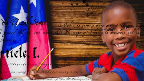 animation of text over boy smiling and american flag on wooden background