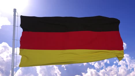 german flag fluttering at the background of clear blue sky