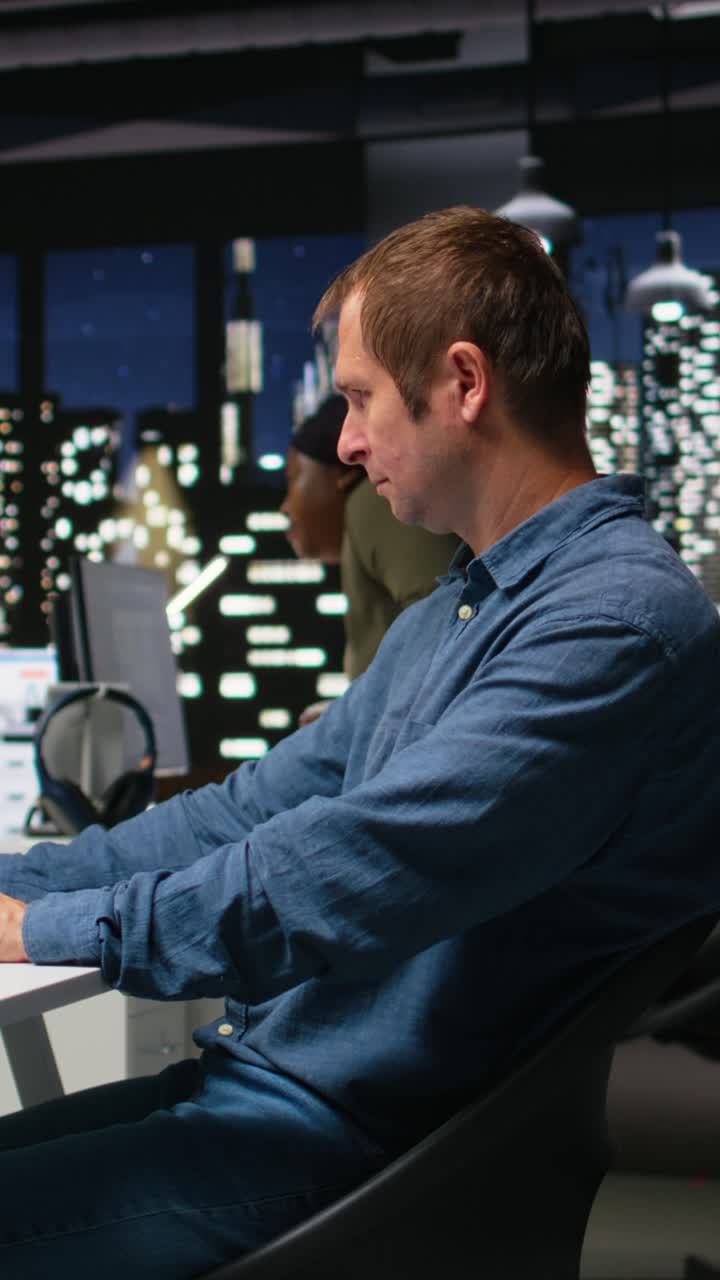 Vertical Video Professional worker in creative office uses CAD software and blueprints plan