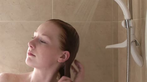 a woman relaxing in the shower