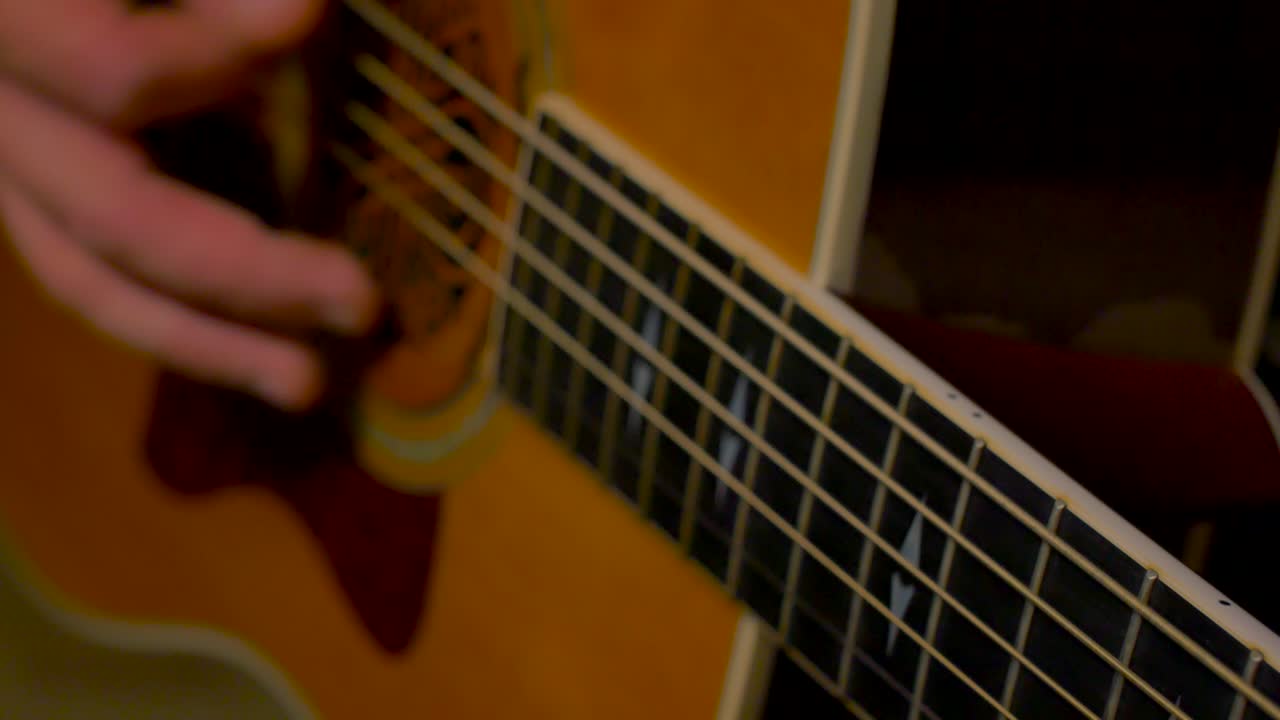 Acoustic guitar fingerpicking and strumming - Color Graded
