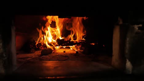 massive fire burning in kiln - close-up panning shot