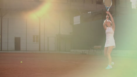 tennis game on sunny day at tennis court young sportive woman playing professional tennis. tennis game on sunny day