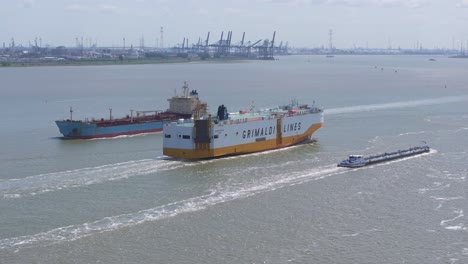 Grimaldi-lines-vessel-and-other-ships-on-the-Westerschelde,-aerial