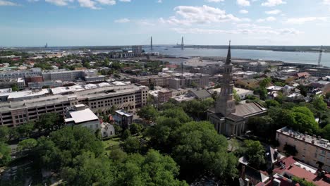 aerial slow move into st philips church with cooper river in the distance