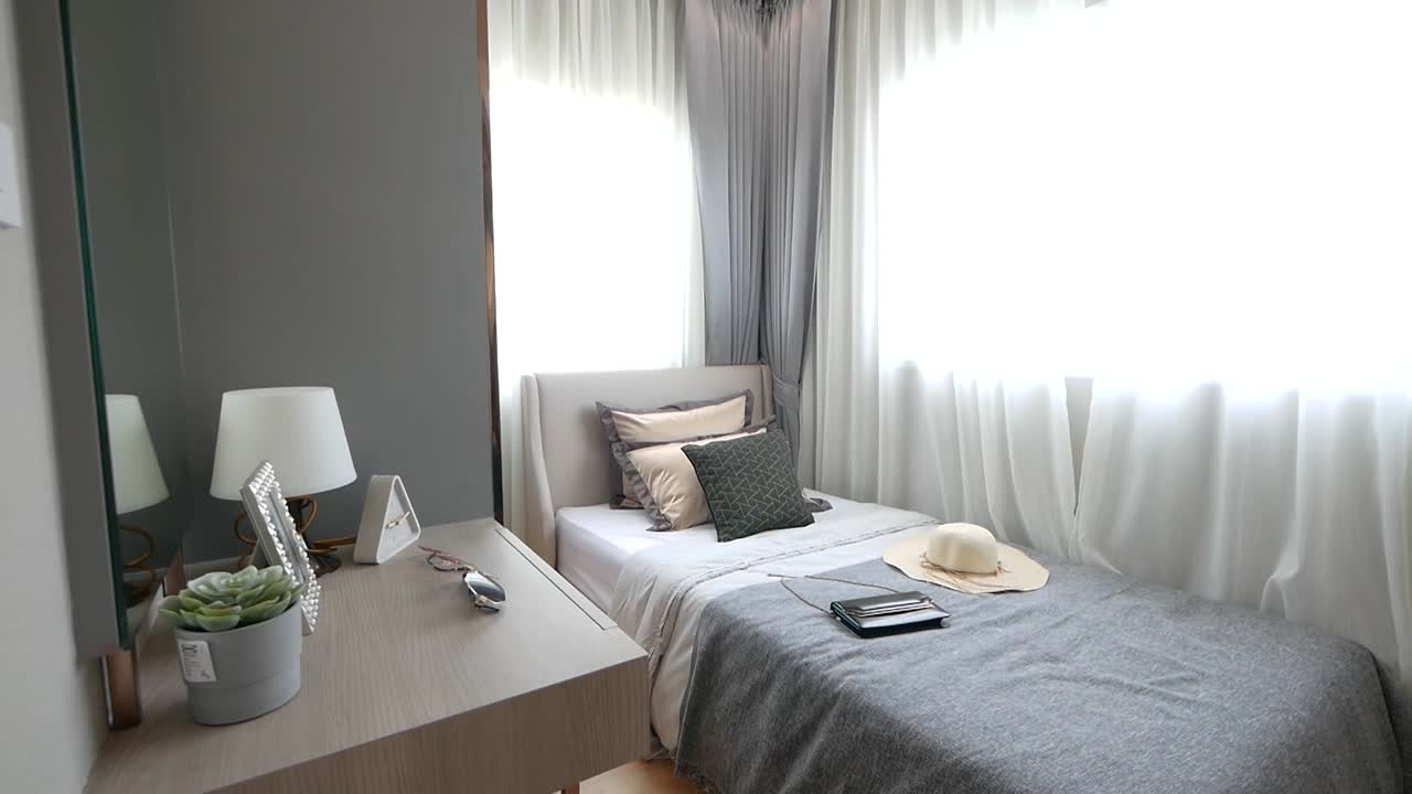 자연 채광이 들어오는 세련된 싱글 침실 장식