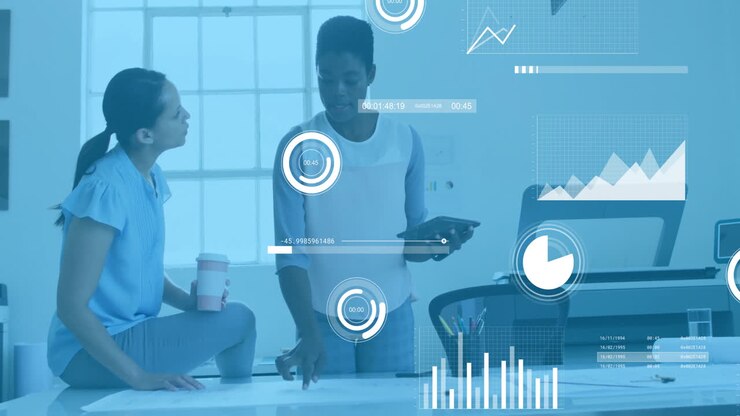 Animation of financial data processing over diverse colleagues discussing work in office