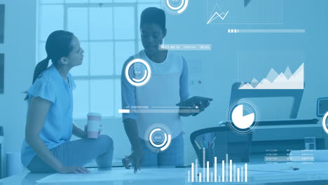 animation of financial data processing over diverse colleagues discussing work in office