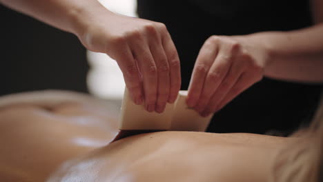 traditional egyptian brush massage for relaxation and meditation woman is relaxing in spa-salon