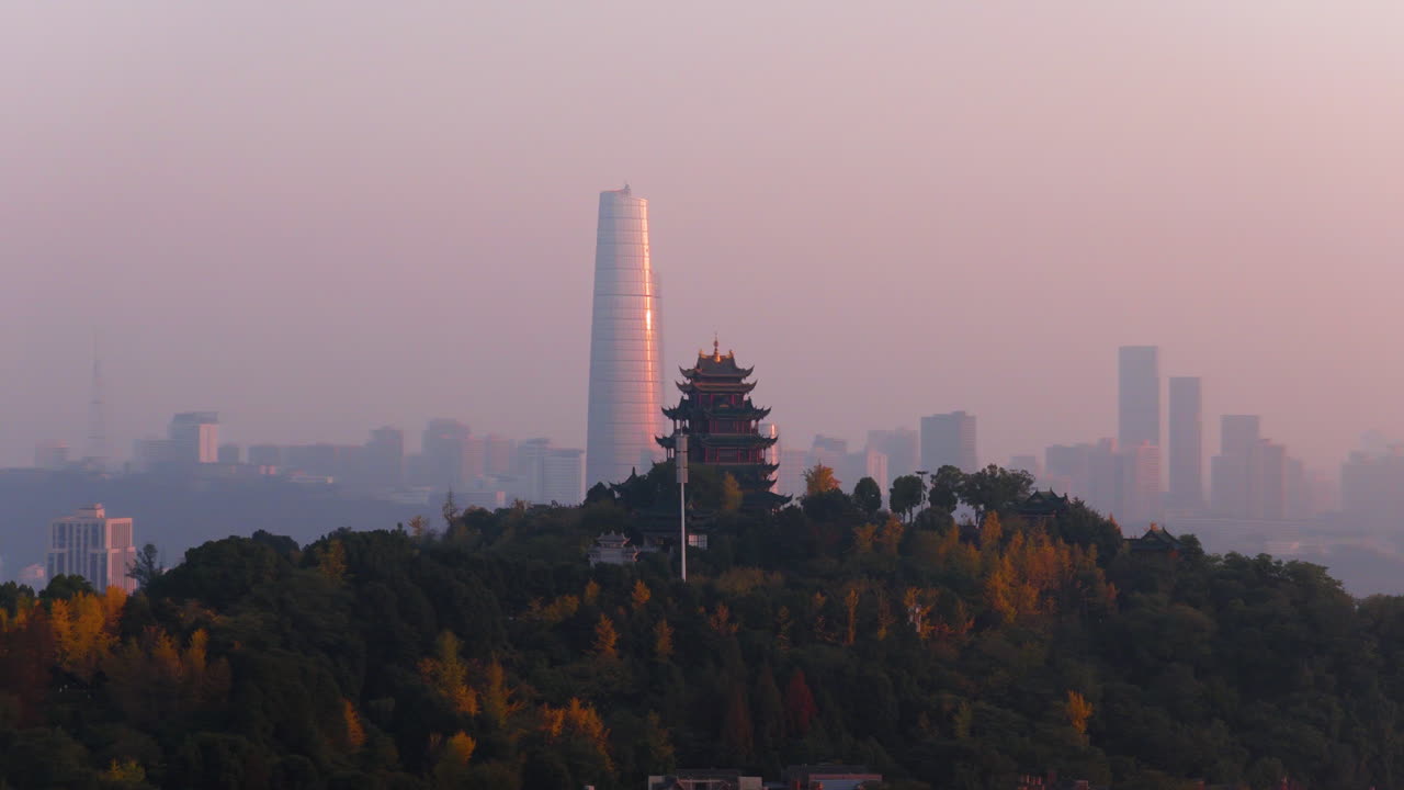 Hong'en Pavilion With Skyscraper In The Background In The Cityscape Of Chongqing, China. - aerial shot