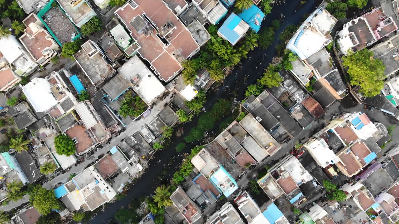 Aerial Shot of Cooum River Going Through Chennai City. The Cooum river is one of the shortest classified rivers draining into the Bay of Bengal.