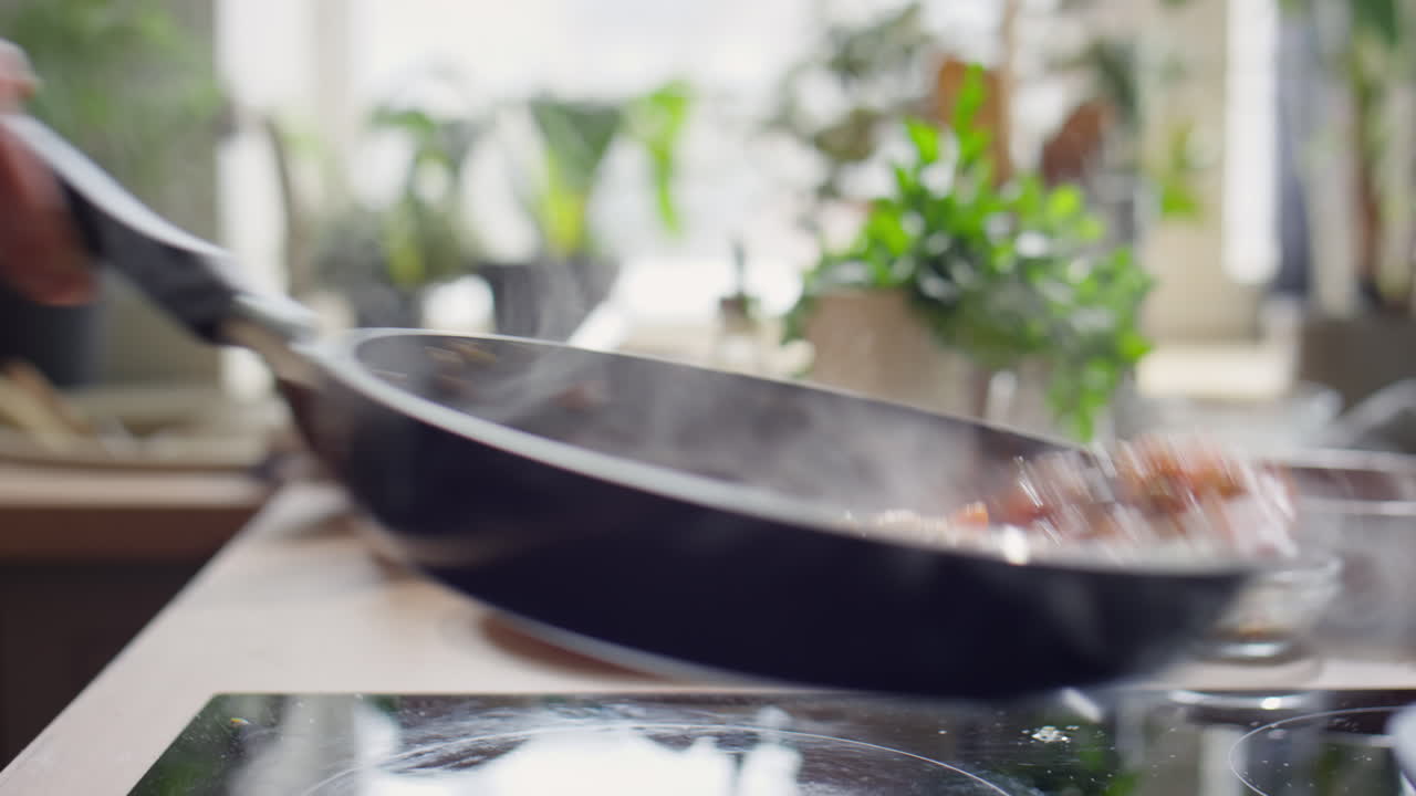 Tossing Food in Frying Pan