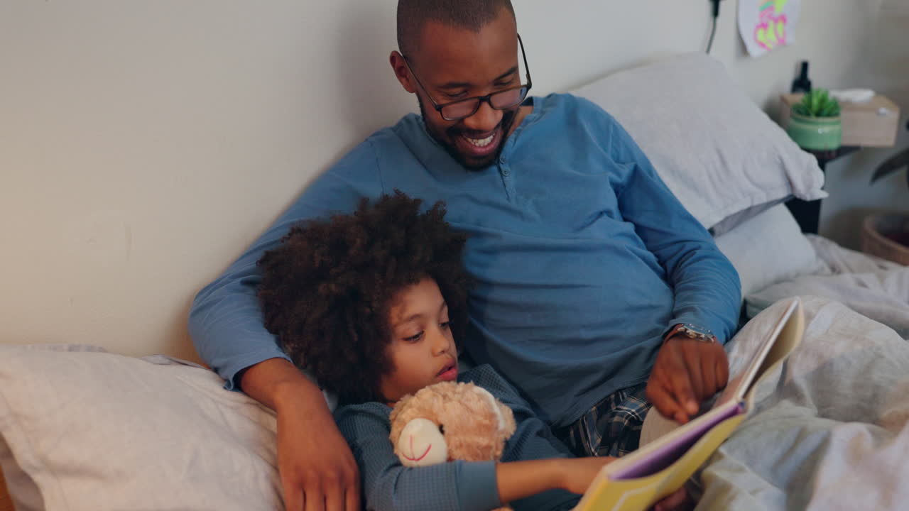 Father Reading Bedtime Story to Son