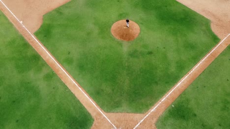 san pedro de macoris, dr - march 12, 2021 - top view of young kids practicing baseball at stadium in san pedro de macoris, open season training, dominican republic