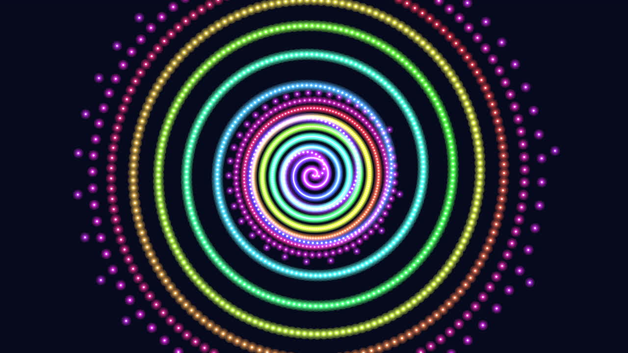 Vibrant, glowing circles in a spiral pattern against a black background. Bright colors overlap in a mesmerizing design, creating a visually striking and captivating image