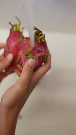 washing dragon fruit