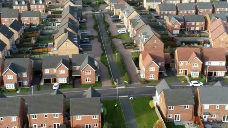 property ladder new british housing estate aerial view overlooking rooftops