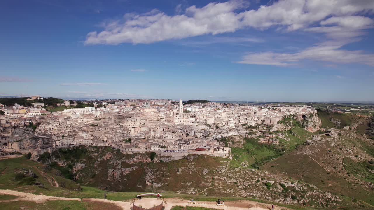 Aerial panorama of old city Matera from a hill viewpoint, wide, Italy