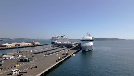 Aerial-drone-video-of-Seattle-Bremerton-ferry-dock,-near-downtown-Seattle,-King-County