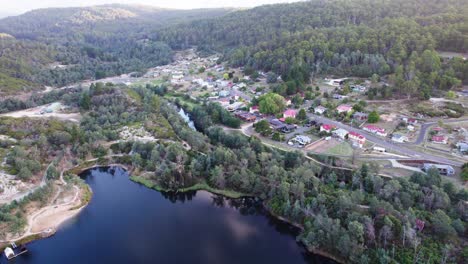 establishing aerial toward town in forest derby, tasmania, australia