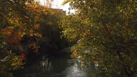 Crossing-a-bridge-over-Nera's-river-on-the-way-to-the-city-center-of-Narni,-Umbria