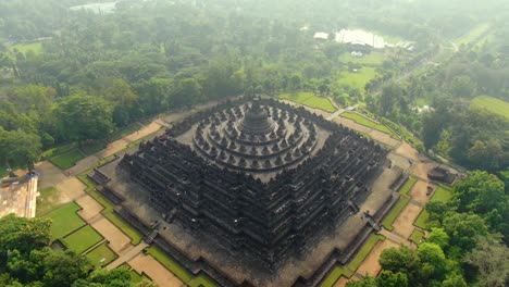 scenic aerial view of empty borobudur temple on misty morning, java, indonesia