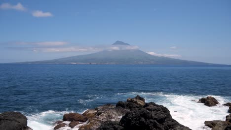 pico mountain in azores, portugal , shot on tripod with waves in foreground