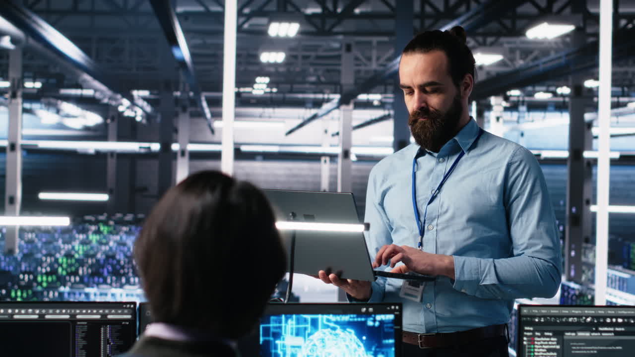 Data Center Technician Using Laptop To Monitor Neural Network Ai Llm