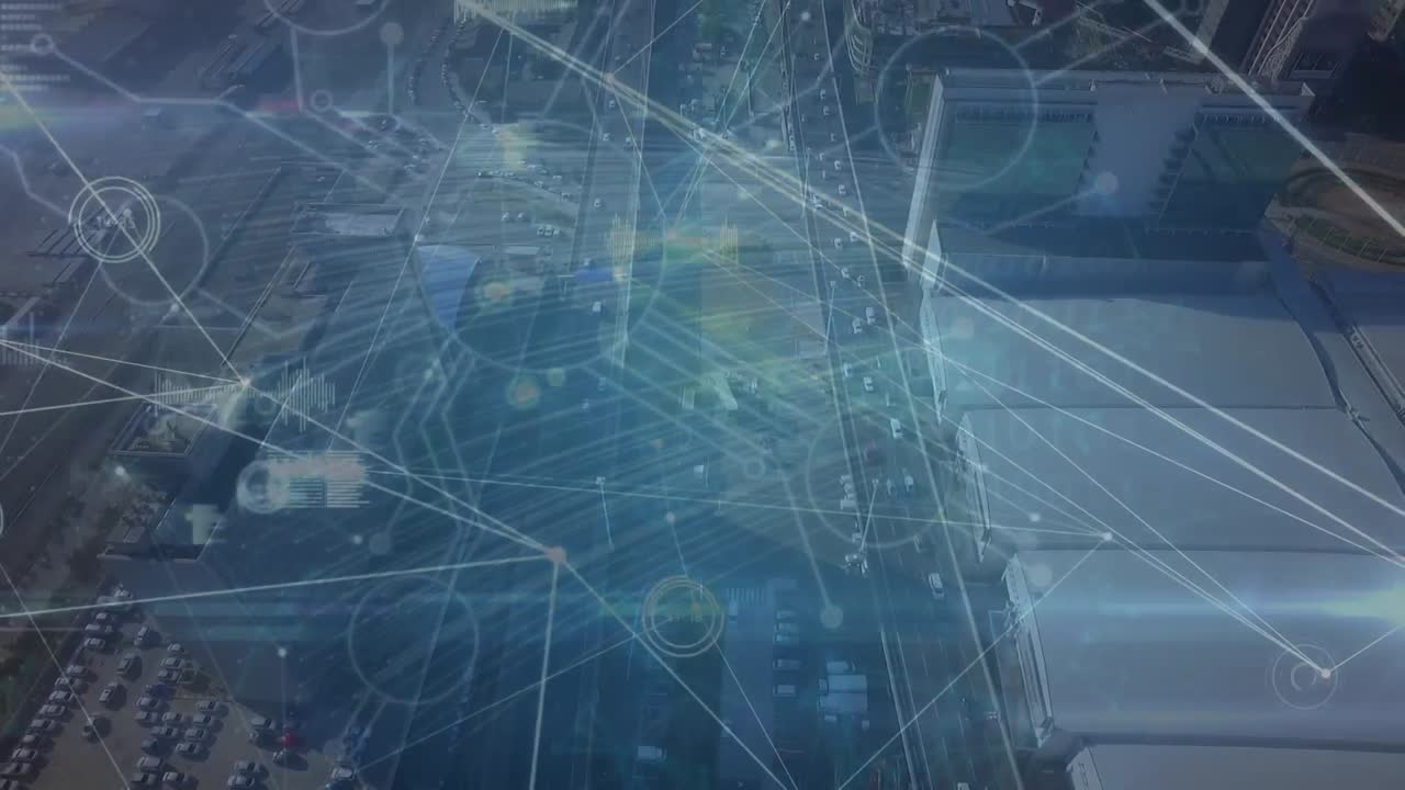 Animation of network of connections and data processing against aerial view of cityscape