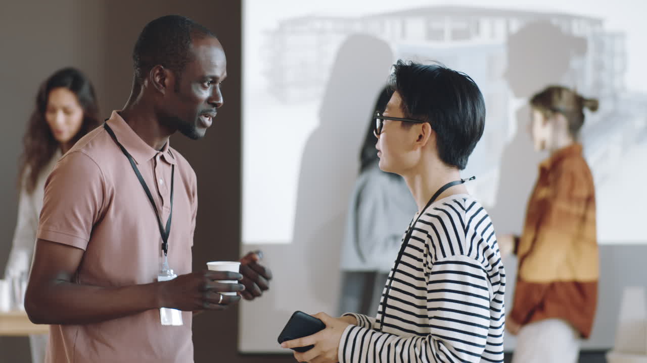Multiethnic Colleagues Speaking on Business Event