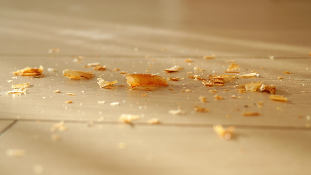 Crumbs on a Wooden Floor