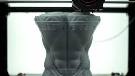 innovative 3d printing process capturing the sculptural form of a muscular vase, showcasing the intricate details and layered structure of modern additive manufacturing techniques