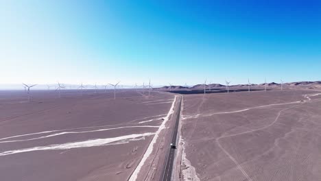 aerial view windmill turbines producing clean sustainable energy - chile