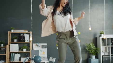woman dancing in office
