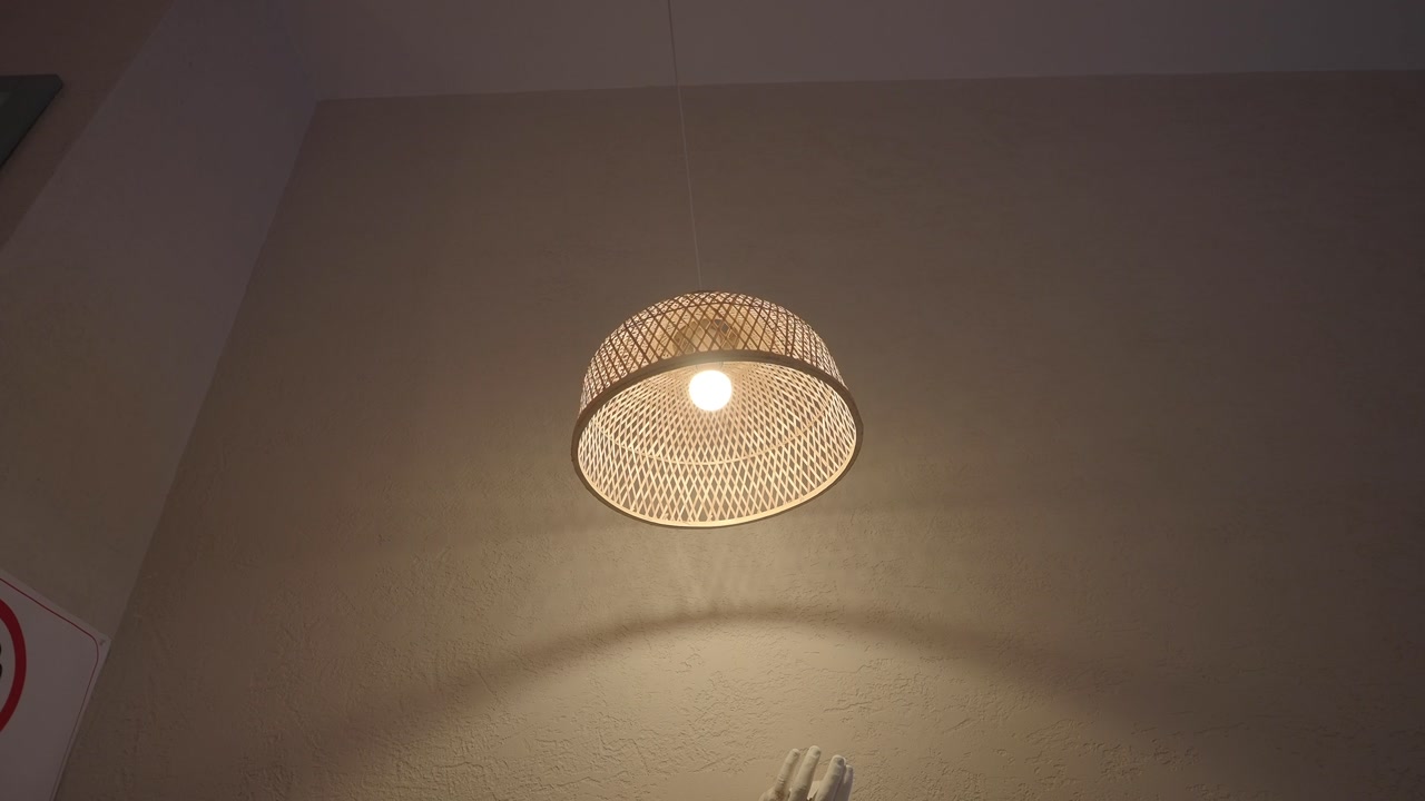 Modern Woven Pendant Light Fixture Hanging from Ceiling