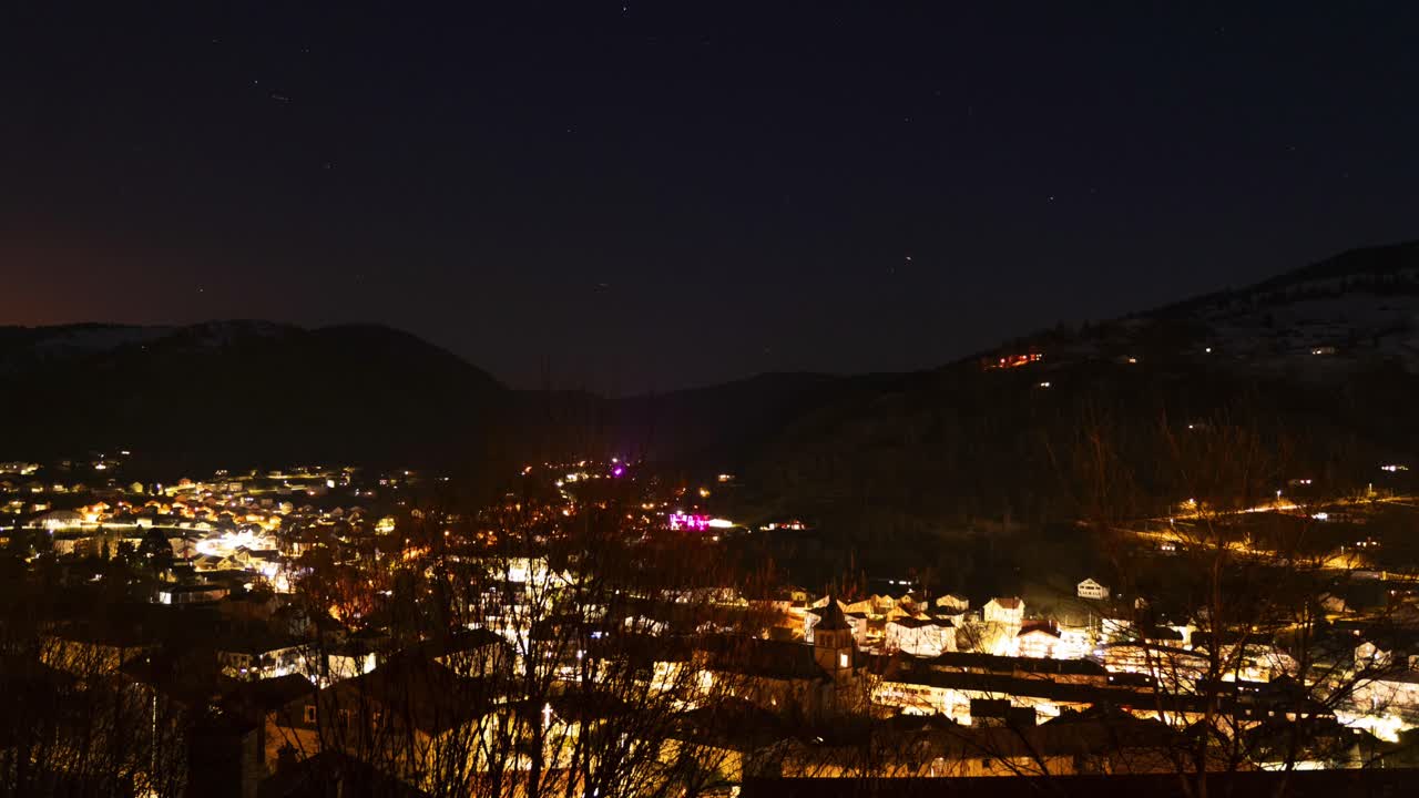 La Bresse France mountain alpine ski resort timelapse day to night winter skyline