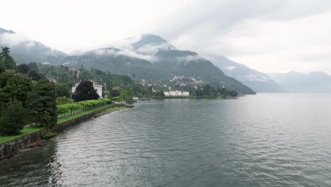 flying along lake como revealing the famous luxury wedding venue villa melzi d´eril in bellagio italy at in its neoclassical architecture revealing the nature and gardens