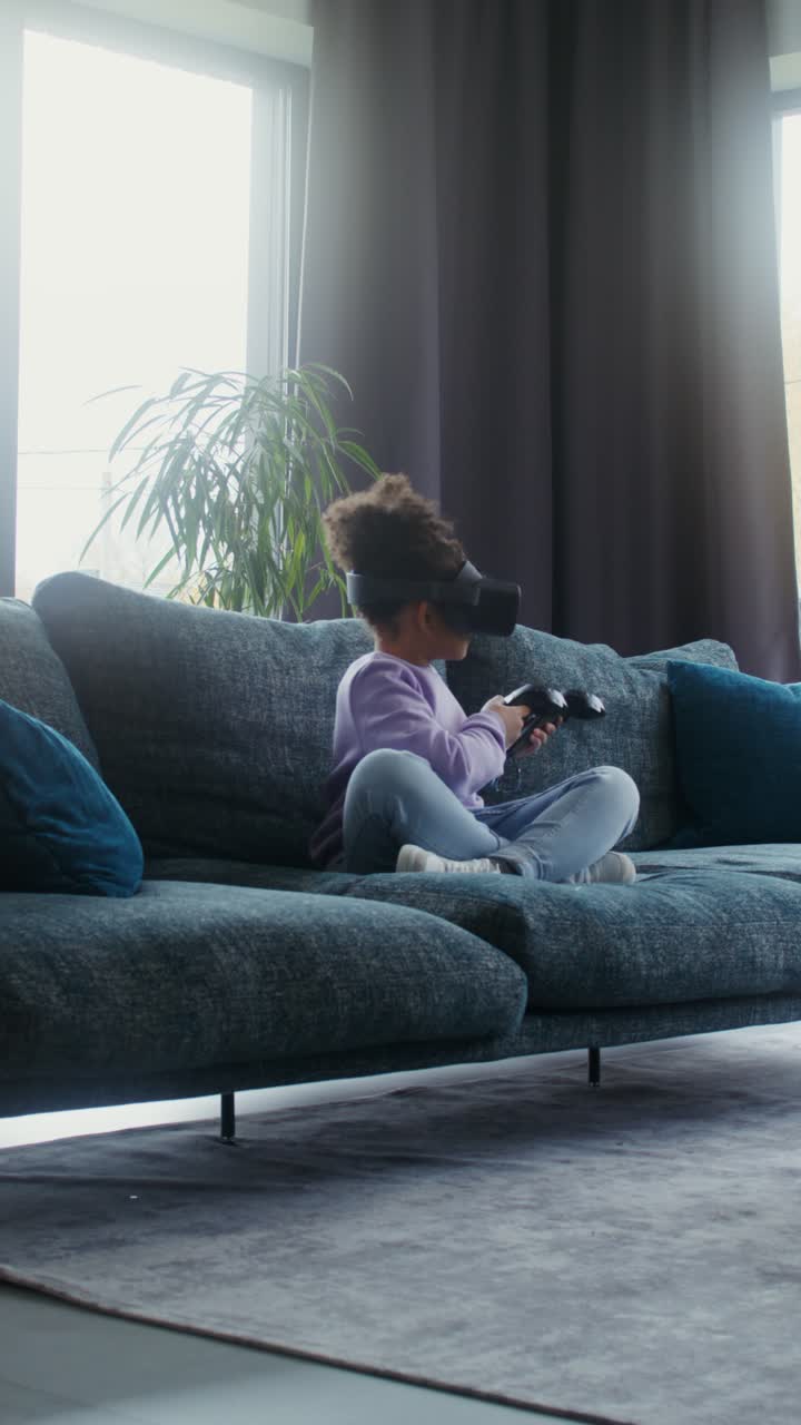 A child playing with VR headset at home