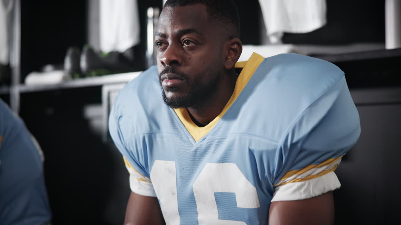 Football player in locker room