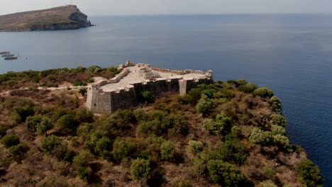 fantastic circular aerial shot over the castle of porto palermo in albania and on a sunny day