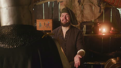 smiling bearded keeper and knight drinking beer in tavern. funny dwarf restaurant owner tries to please honorable guest with alcohol at inn. dark medieval fantasy