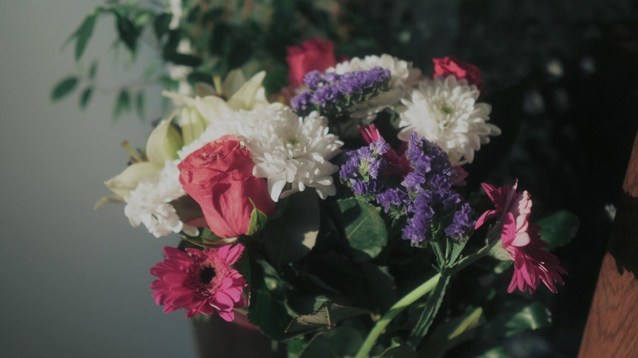 Colorful bouquet of flowers in sunset light