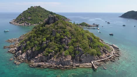 aerial view of a tropical island with blue water